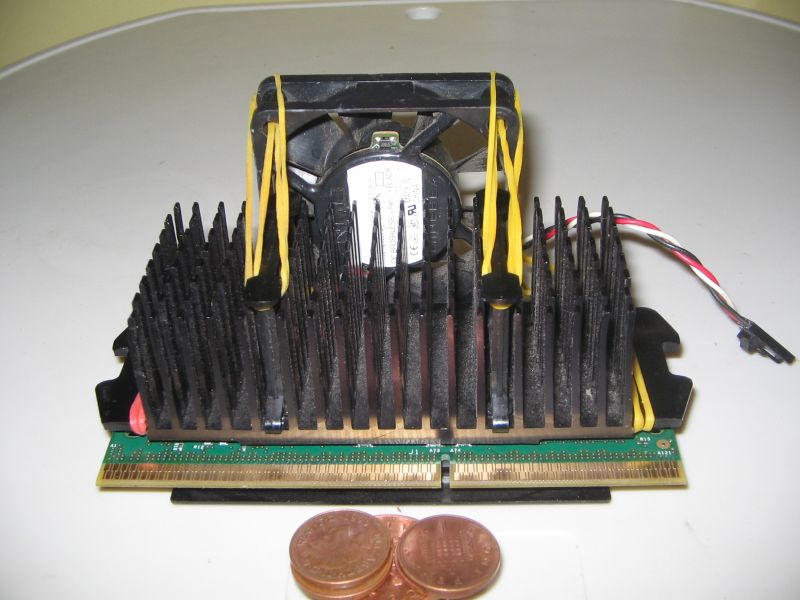 Pulling the rubber bands under the heatsink retention clips