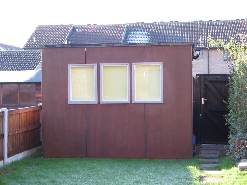 Not shown: recently added light to the front of the shed, and plastic panels to the windows to keep heat in